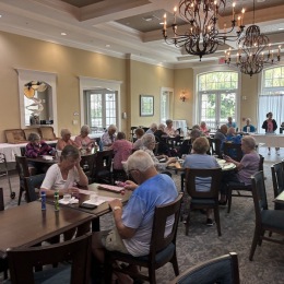 a group of people playing bingo